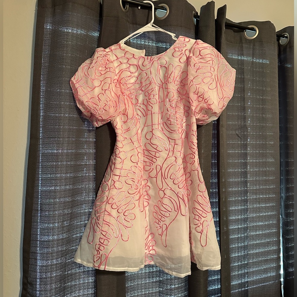 White and Pink mini dress with puff sleeves.